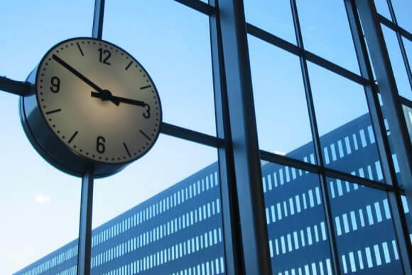 Clock and office buildings
